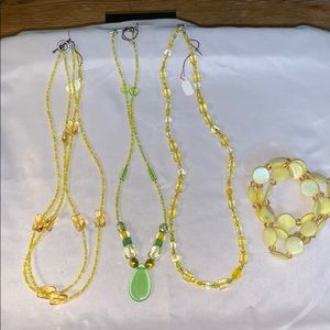3 yellow beaded necklaces and 1 bracelet